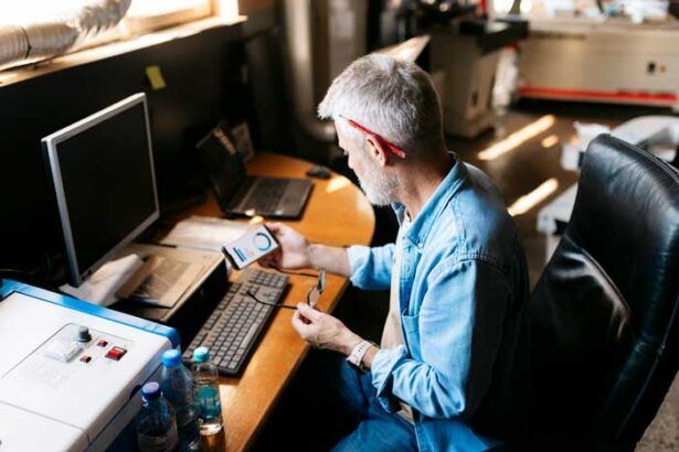 A business owner reviews data on his mobile device from the fuel card usage of his fleet.